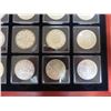 Image 4 : Lot of 20 Canadian Silver Dollars from 1935 to 1967. Housed in hard plastic holders inside a fancy w