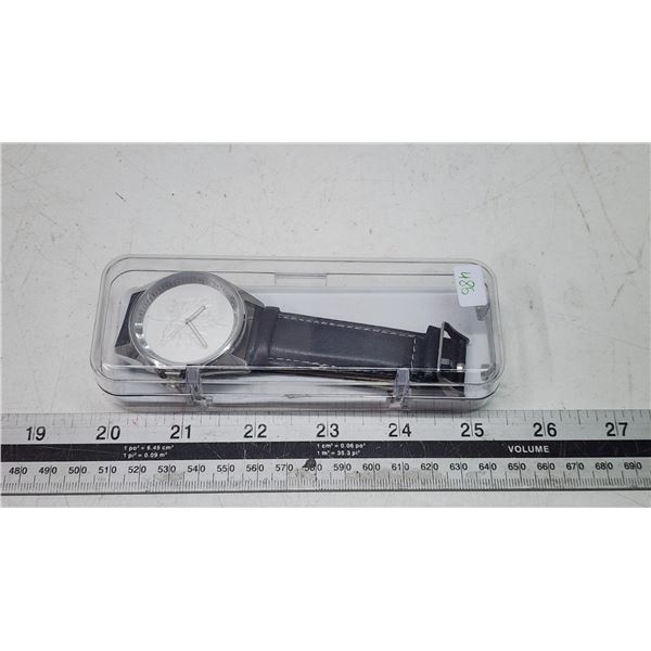 "Fabulous 5" silver maple leaf, Miyota wrist watch. Quartz movement, black leather strap, waterproof