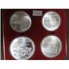 Image 2 : 1976 montreal olympics sterling silver 4- coin set;  $5 Athlete with torch and olympic rings ; $10 Z