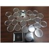 Image 1 : Lot of 25 hard plastic holders for Canadian coins, mostly silver dollars.
