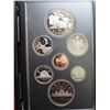 Image 1 : 1981 Double Dollar Proof Set. The Silver Dollar commemorates the beginning of the trans-Continental 