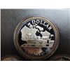 Image 2 : 1981 Double Dollar Proof Set. The Silver Dollar commemorates the beginning of the trans-Continental 