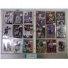 Image 1 : (2) Binders of Cards Featuring NFL Players Adrian Peterson and Drew Bledsoe
