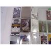 Image 2 : (2) Binders of Cards Featuring NFL Players Adrian Peterson and Drew Bledsoe