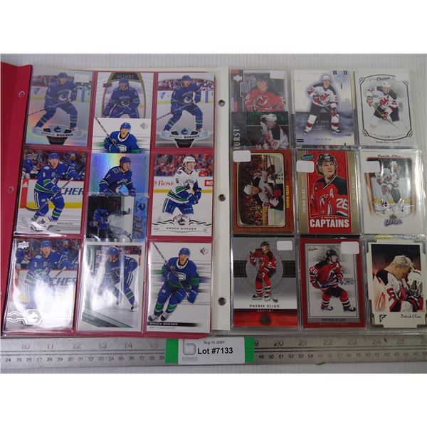 (2) Binders of Cards Featuring NHL Players Patrick Elias and Brock Boeser