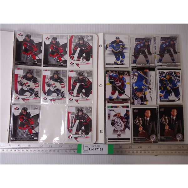 (2) Binders of Cards Featuring NHL Players Alexis Lafreniere and Ryan O'Reilly