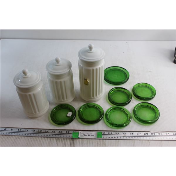 (7) Green Glass Coasters and (3) Glass Storage Jars