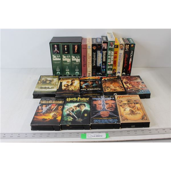 (25) Assorted VHS Tapes - The Godfather, Indiana Jones, Harry Potter, Pirates Of The Caribbean, Lord