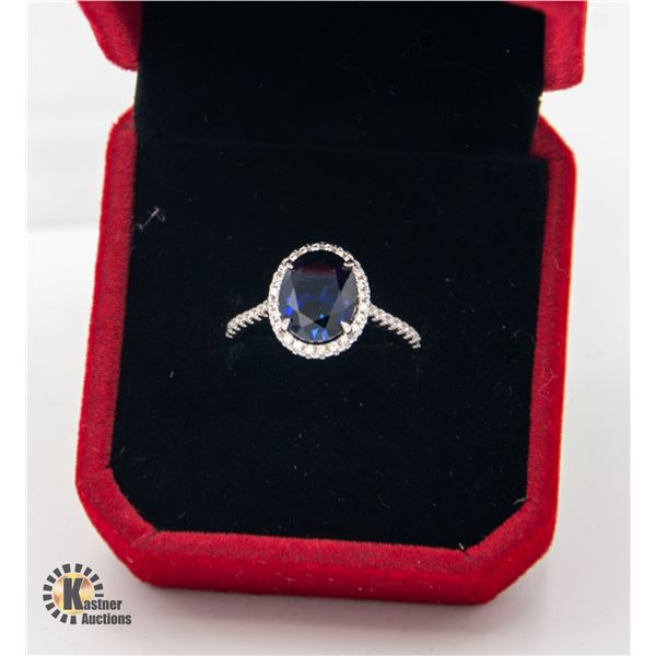 #441-8X10 OVAL LAB CREATED SAPPHIRE WITH 47 X.01CT