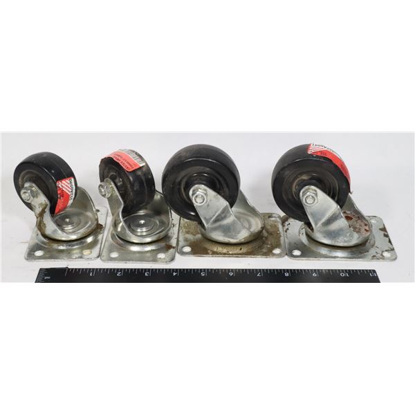 FOUR HEAVY DUTY SWIVEL CASTORS