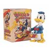 Image 1 : A "Walt Disney's Donald the Drummer" Toy and Box.