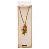 Image 1 : A Walt Disney World Orange Bird Necklace.
