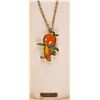 Image 2 : A Walt Disney World Orange Bird Necklace.