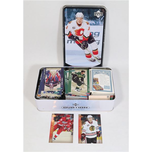TIN OF ASSORTED HOCKEY CARDS, SPLIT BETWEEN