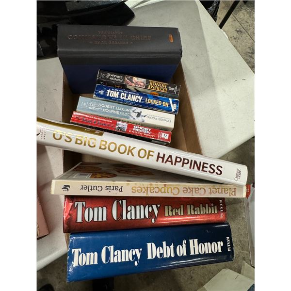 Tom Clancy, o's big book of happiness, and planet cake cupcakes book