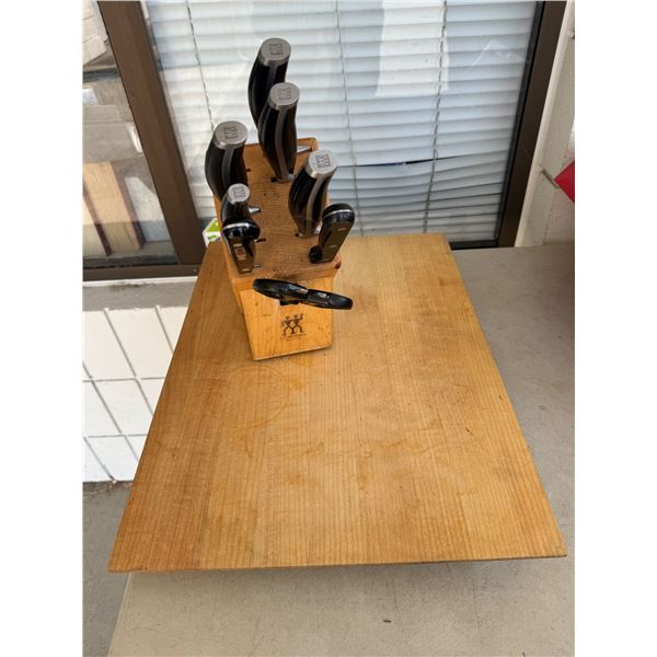 Cutting board and henckle knives and block