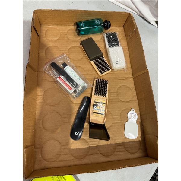 Travel items and empty Hermes bottle