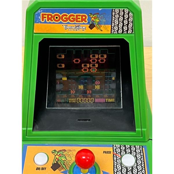 Frogger by Excalibur Electronics Tabletop Arcade Game - Powers up, no battery cover, see photos