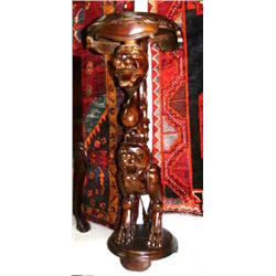 Ornately carved, mahogany finish plant stands with 2 lions (1)