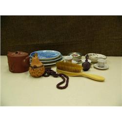 Lot of miniature teacups, saucers, Christmas collector's plates, red ware teapot, perfume bottle, be