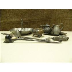 Miniature pewter tea set, miniature pewter water jug, 3 candle snuffers, pewter manger, silver tea s