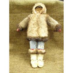 Native doll with carved wood face, seal skin, mink (2)