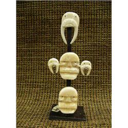 3 ivory masks mounted on baleen with baleen inset eyes by Mark Seeganna (2)