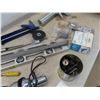 Image 5 : Levels, Caulking Gun, Tape Measure, Hole Saw, Drill Chuck, Heat Gun, Plus