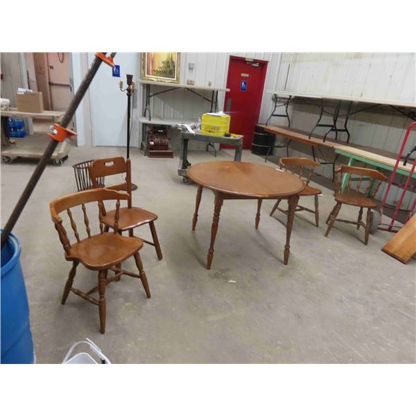 Table 29'' Tall x 42'' Across , 2 Leaves , 4 Chairs (3 are Matching)