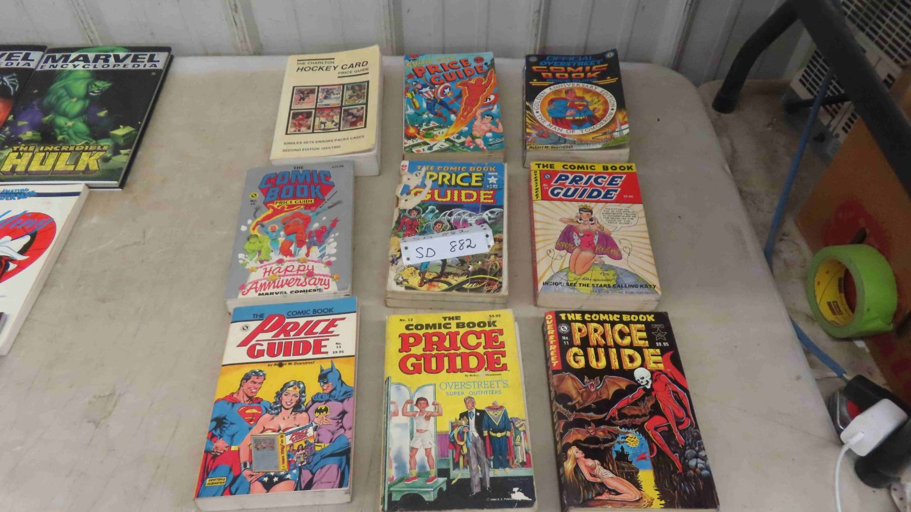 8 Comic Book Price Guides , 1 Hockey Card Price Guide