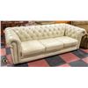 Image 1 : OFF-WHITE STUDDED LEATHER 3 SEATER SOFA