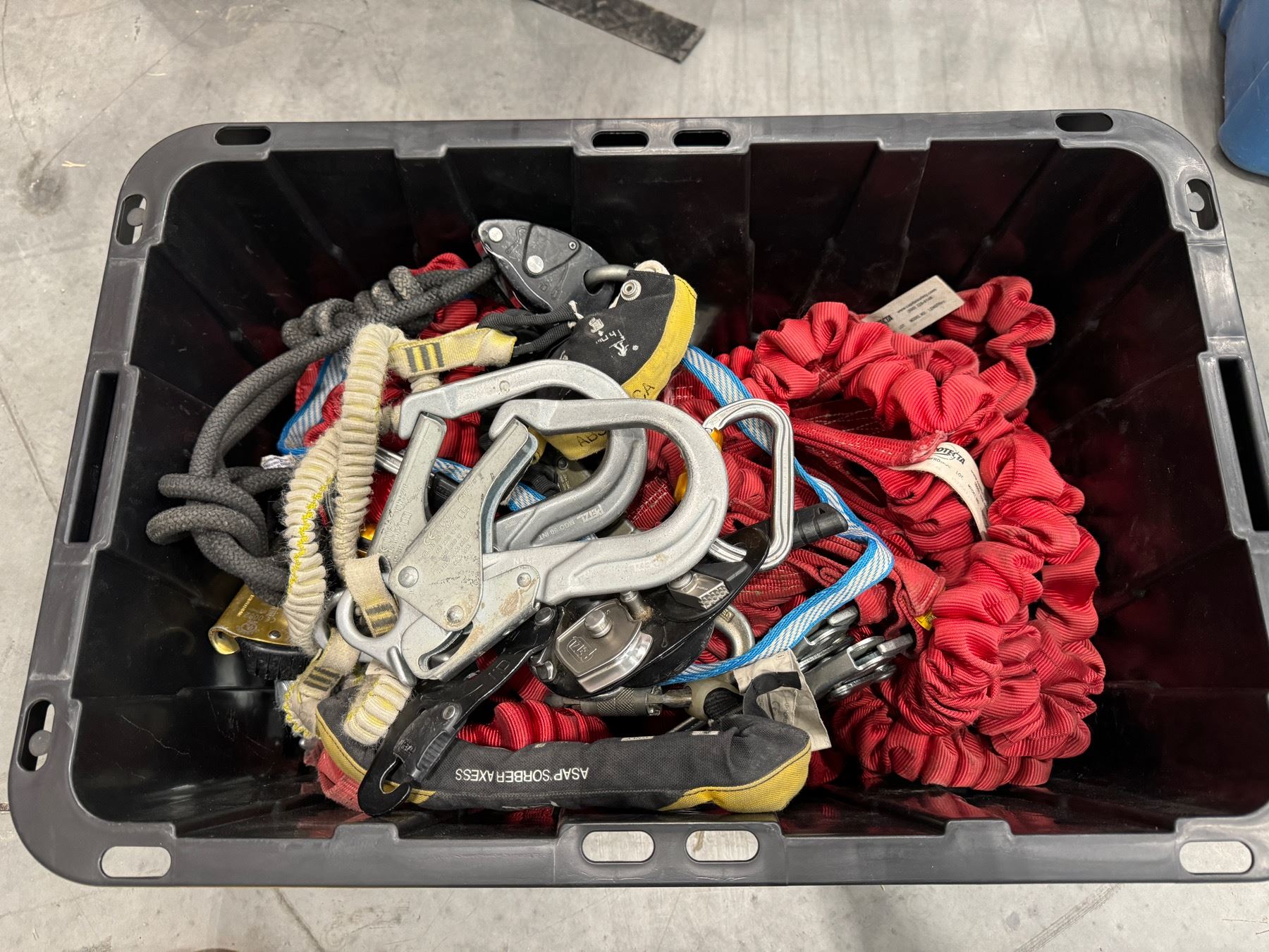 Harness Lock Box Box of assorted harness attachments