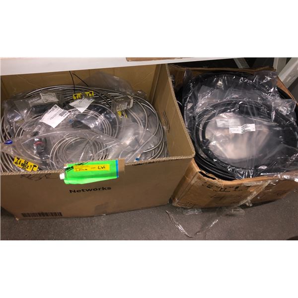 2 boxes full of assorted jumper cables & fiber armoured cables