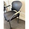 Image 2 : Two rolling office chairs