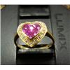 Image 1 : Heart shaped 14K yellow gold sapphire ring: 8 pink sapphires and 16 .15 carat diamonds (217)