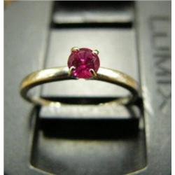 CHOICE on 4 rings: reddish stone (217)