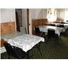 Image 27 : Large lot of Restaurant items: Misc. sized tables, chairs, table clothes, TV's, microwaves, large 3 