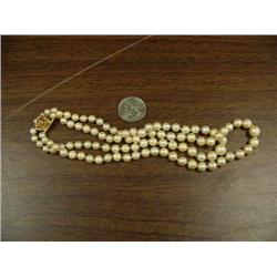 Double strand pearl necklace with rose clasp (180)