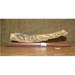 Fossilized mammoth bark relief carved with penguins (2)