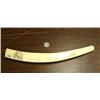 Image 1 : Ivory scrimshawed tusk on all four sides: walrus, polar bear face, seal, mukluk, mitten, seal, tool,