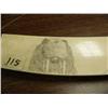 Image 2 : Ivory scrimshawed tusk on all four sides: walrus, polar bear face, seal, mukluk, mitten, seal, tool,