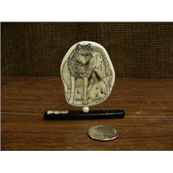 Ivory scrimshawed platchet of wolf by Norman Cole on baleen base 3" tall (3)