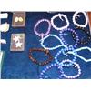 Image 8 : Lot of: '91 Fur Rondy memorabilia, 2 Alaska Scrimshaw kits, 9 pairs of earrings, 3 earring and neckl