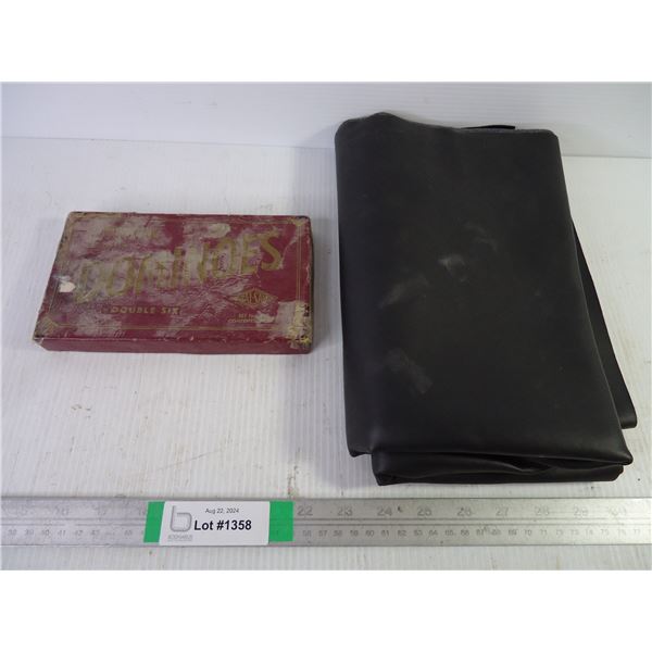 Vintage Dominos Game and Piece of Leather Material