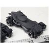 Image 5 : Four small Batmobiles tracing evolution of design)