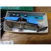 Image 3 : Automatic button holder and black sewing machine attachments tin