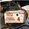 Image 3 : Group of 2 assorted battery chargers w/ box full of misc. - jumper cables/ air compressor/ tarp
