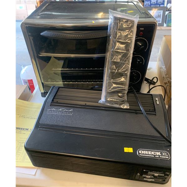 Hamilton Beach Toaster Oven and 2 Oreck XL Air Purifiers, Walnut one is New In Box Other Like New