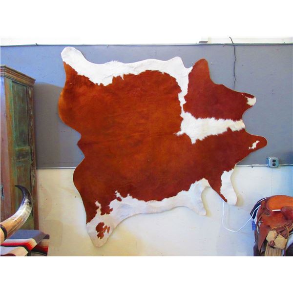 Tanned Cowhide- 75" X 61"