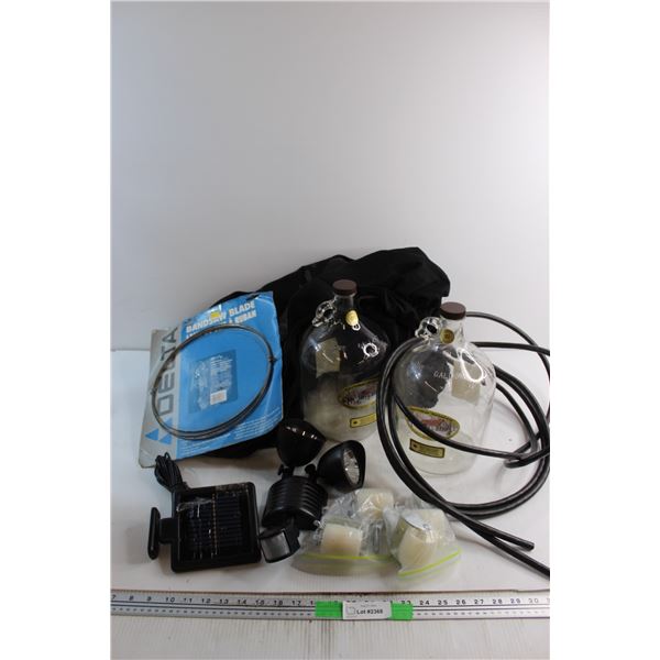Sun Powered Light and Sun Panel, (2) 1 GAL Jugs, (2) Seat Covers and Assorted Items